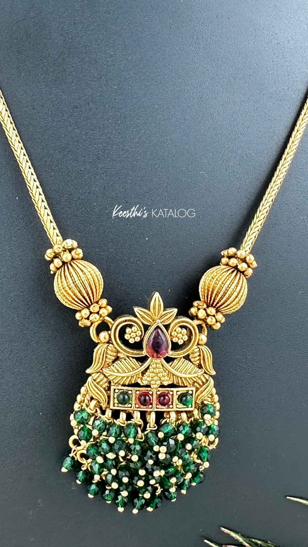 KN1132 - Emerald Cluster Necklace Set