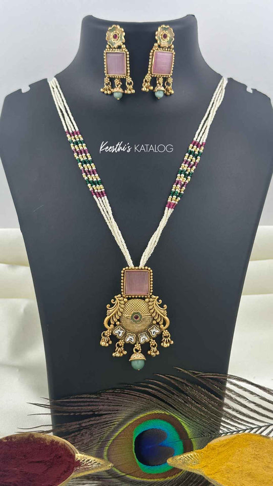 KN1184 - Vella Muthu Maala