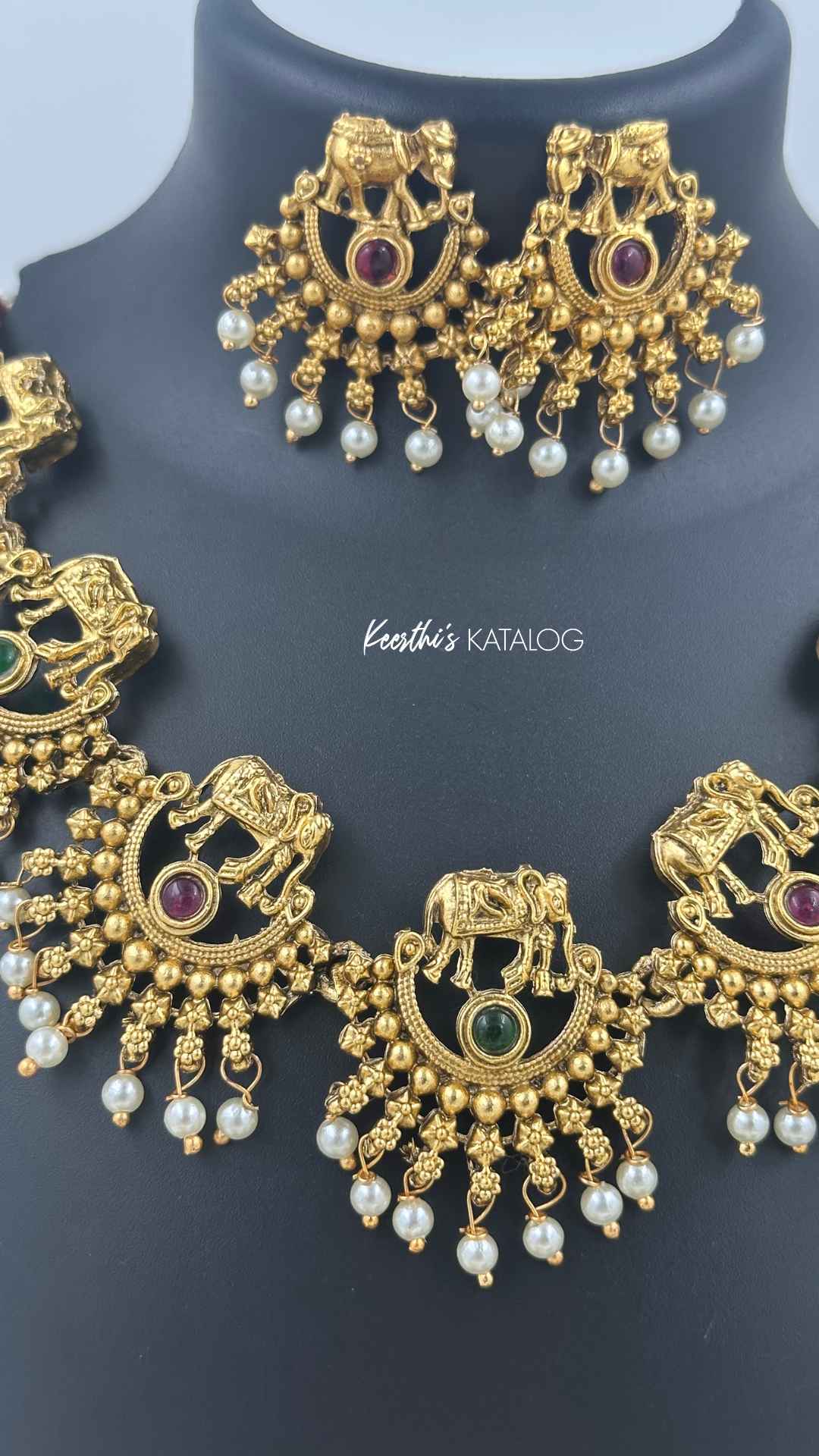 KN1209 - Pooram Aana Maala