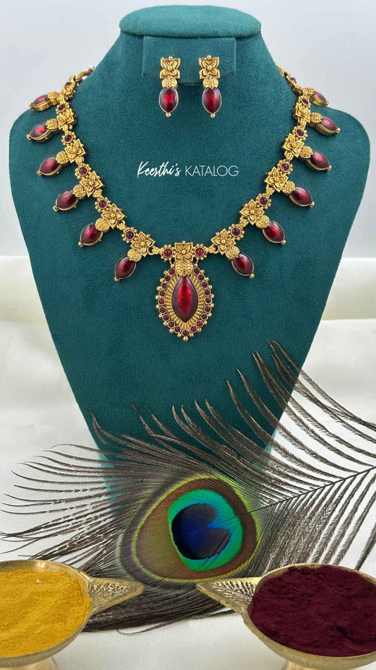 KN1242 - Chuvanna Pushpam Maala